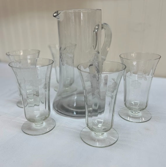 Etched clear glass pitcher with matching glasses
