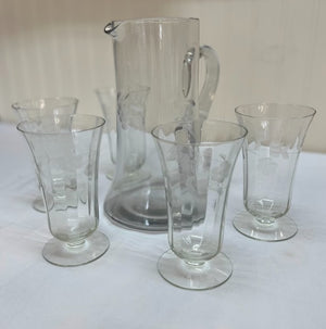 Etched clear glass pitcher with matching glasses
